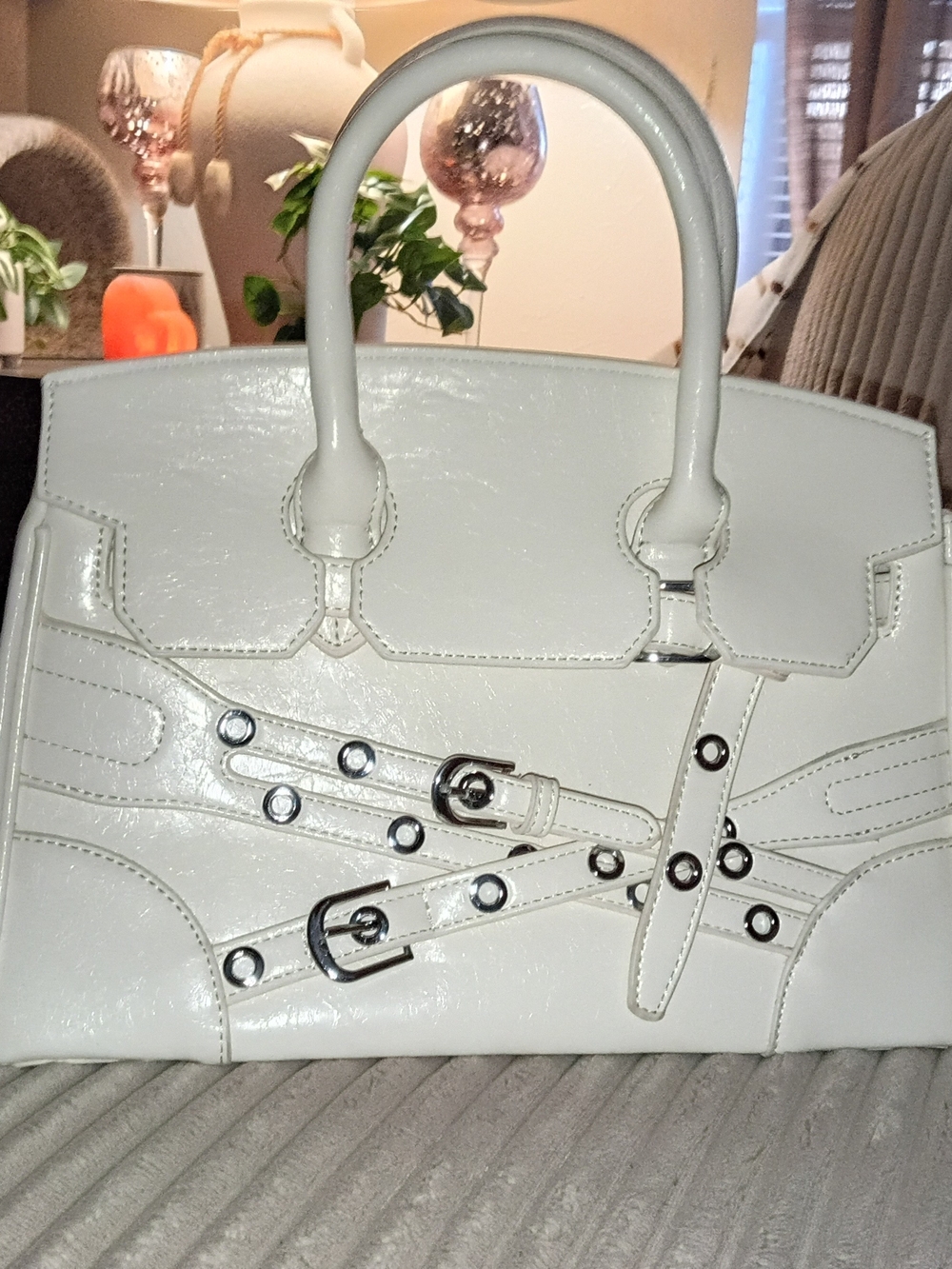 Elegant White Satchel with Buckle & Grommet Detail